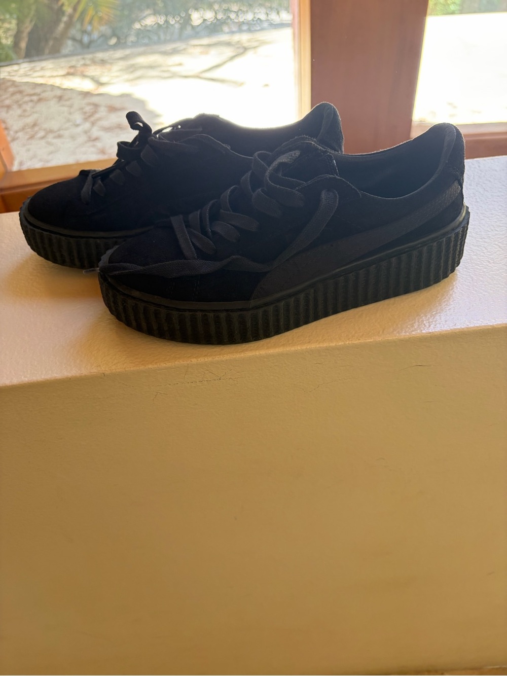 Puma Women’s All-Black Platform Sneakers